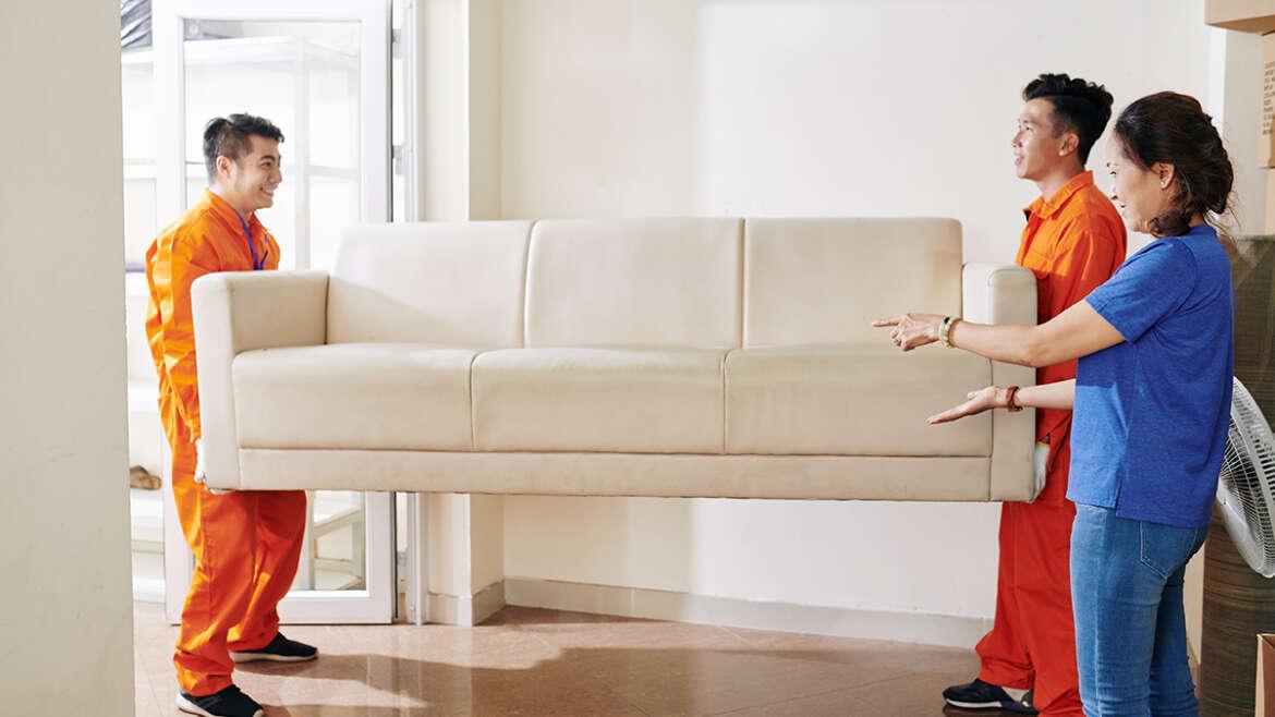 Movers handling heavy items for relocation, TrekMovers