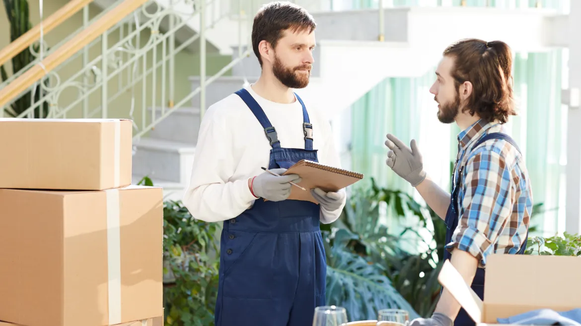 Team labeling boxes during a move, TrekMovers