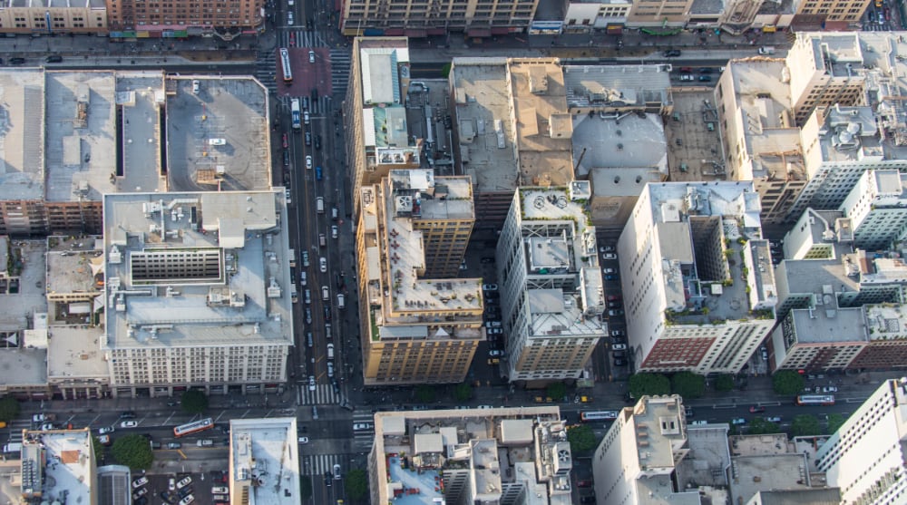 Apartment buildings in Los Angeles with rental price signs, TrekMovers